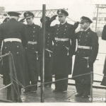 U 869 Comm 5
