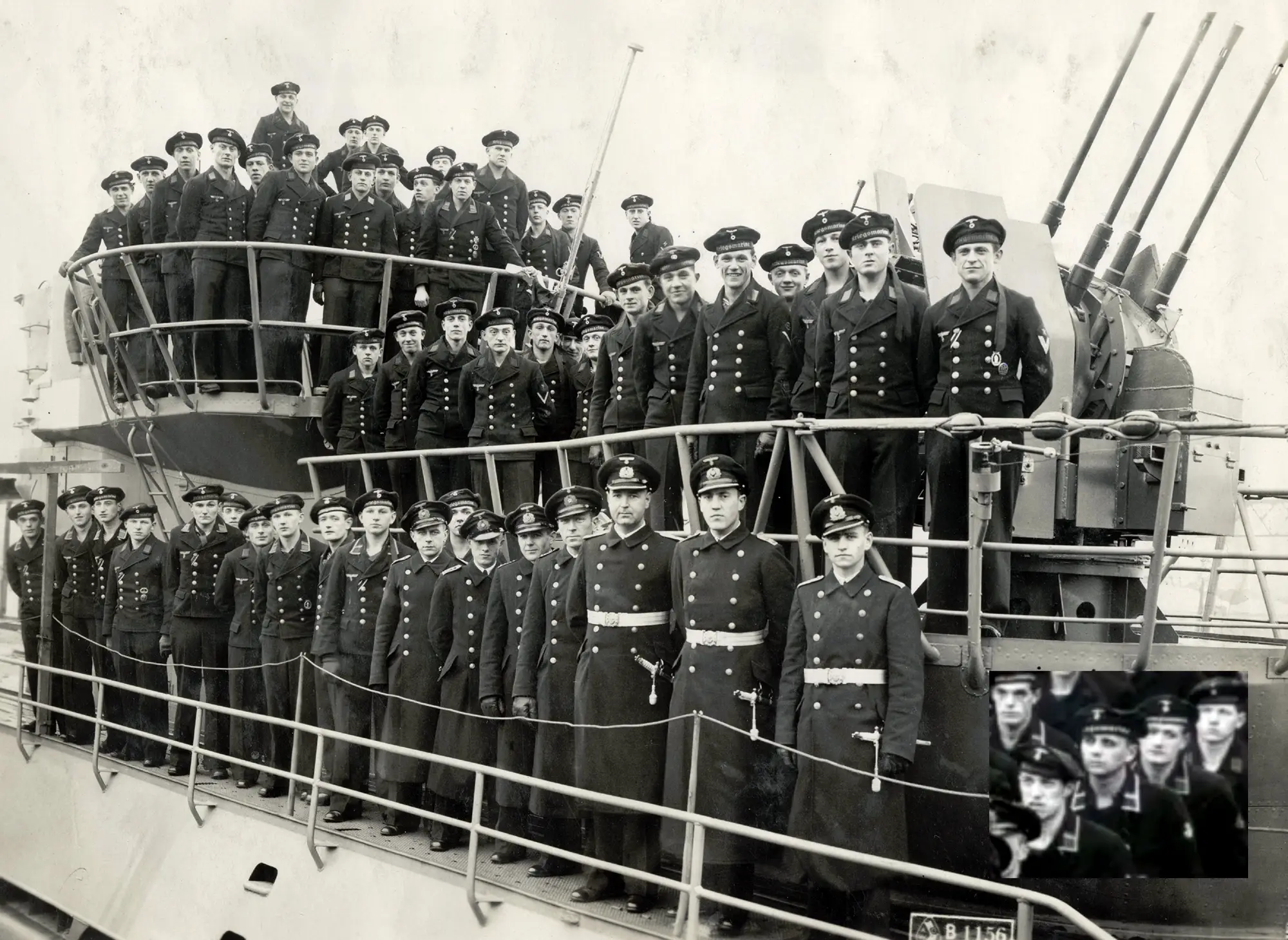 The crew of U-869 assembled aboard ship.